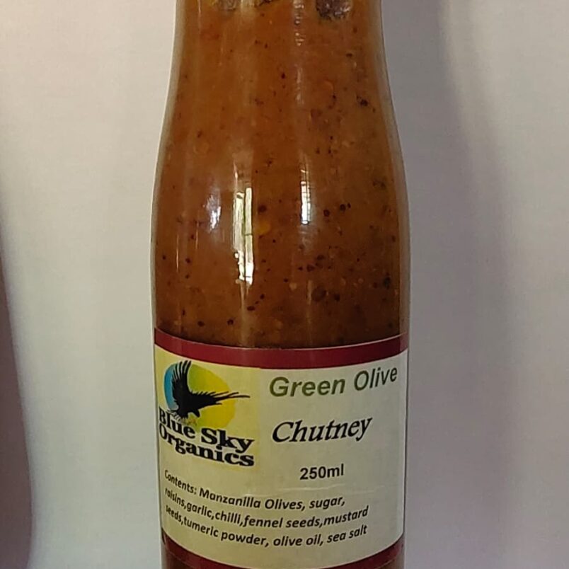 This is a product image showcasing our organic Green Olive Chutney. Made with fresh green olives and a blend of spices, it adds a burst of flavour to your meals, especially when paired with cheese and chicken.